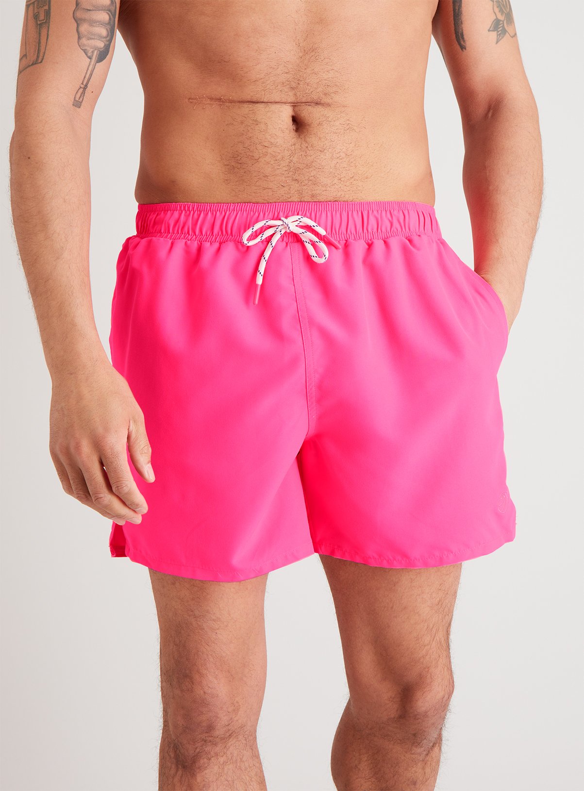 neon pink swim trunks