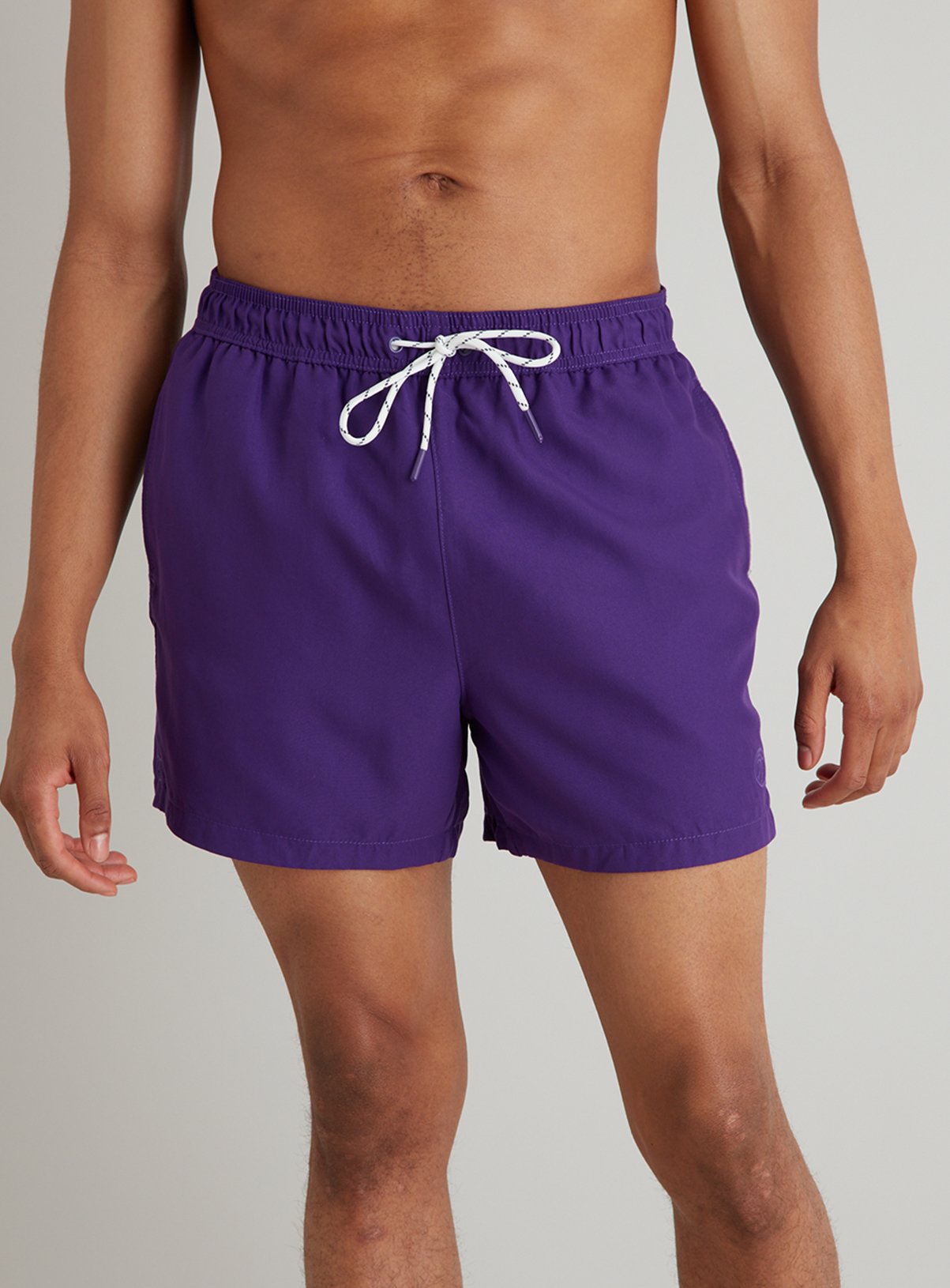 purple swim trunks