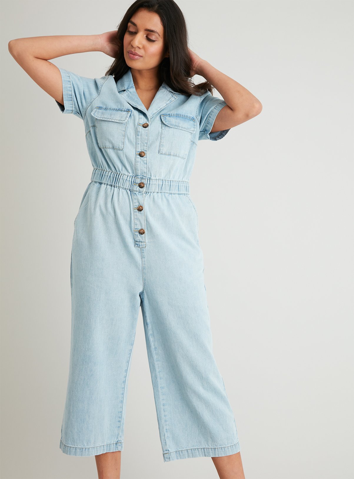 pale pink boiler suit