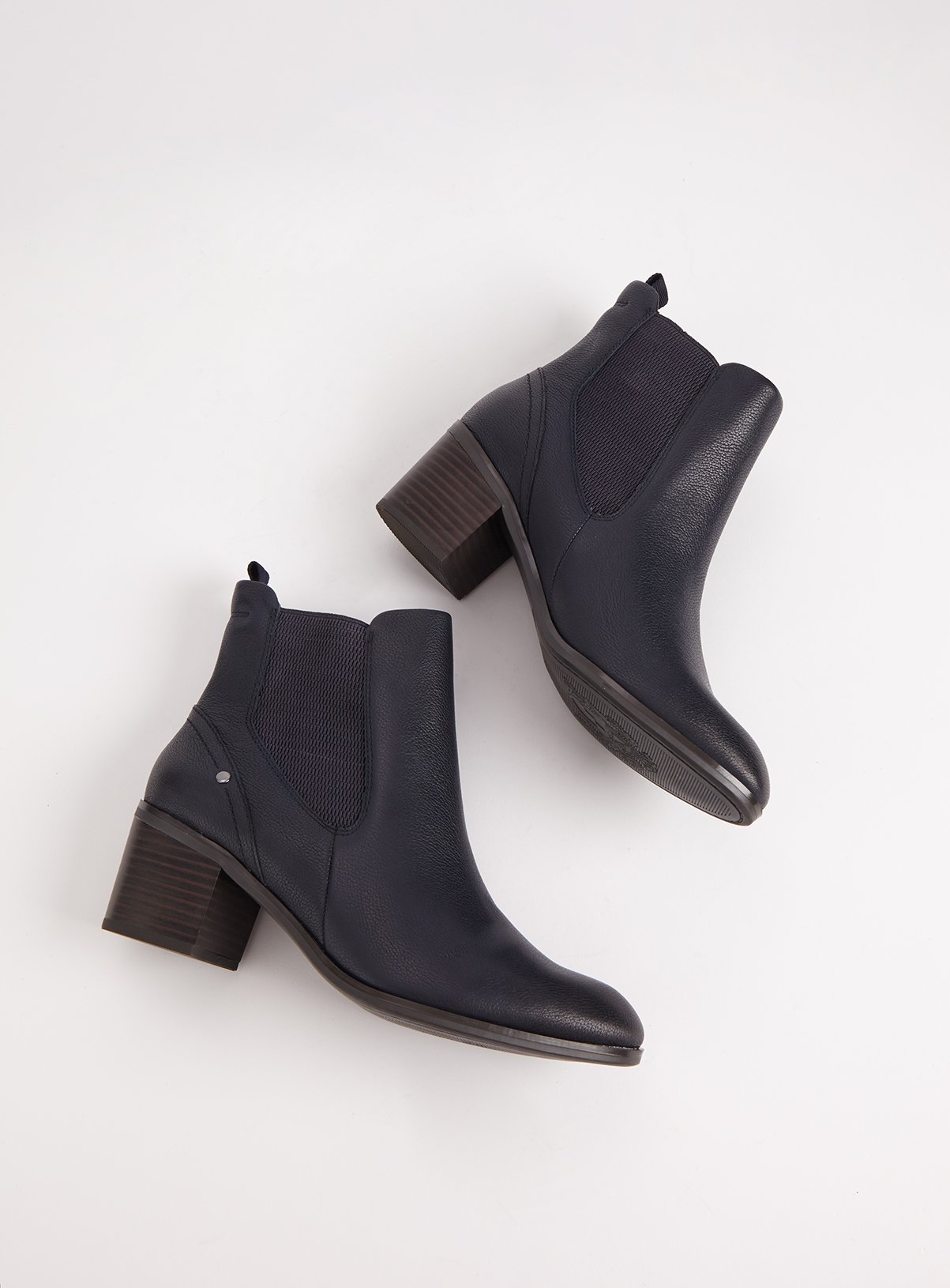 black leather heeled chelsea boots