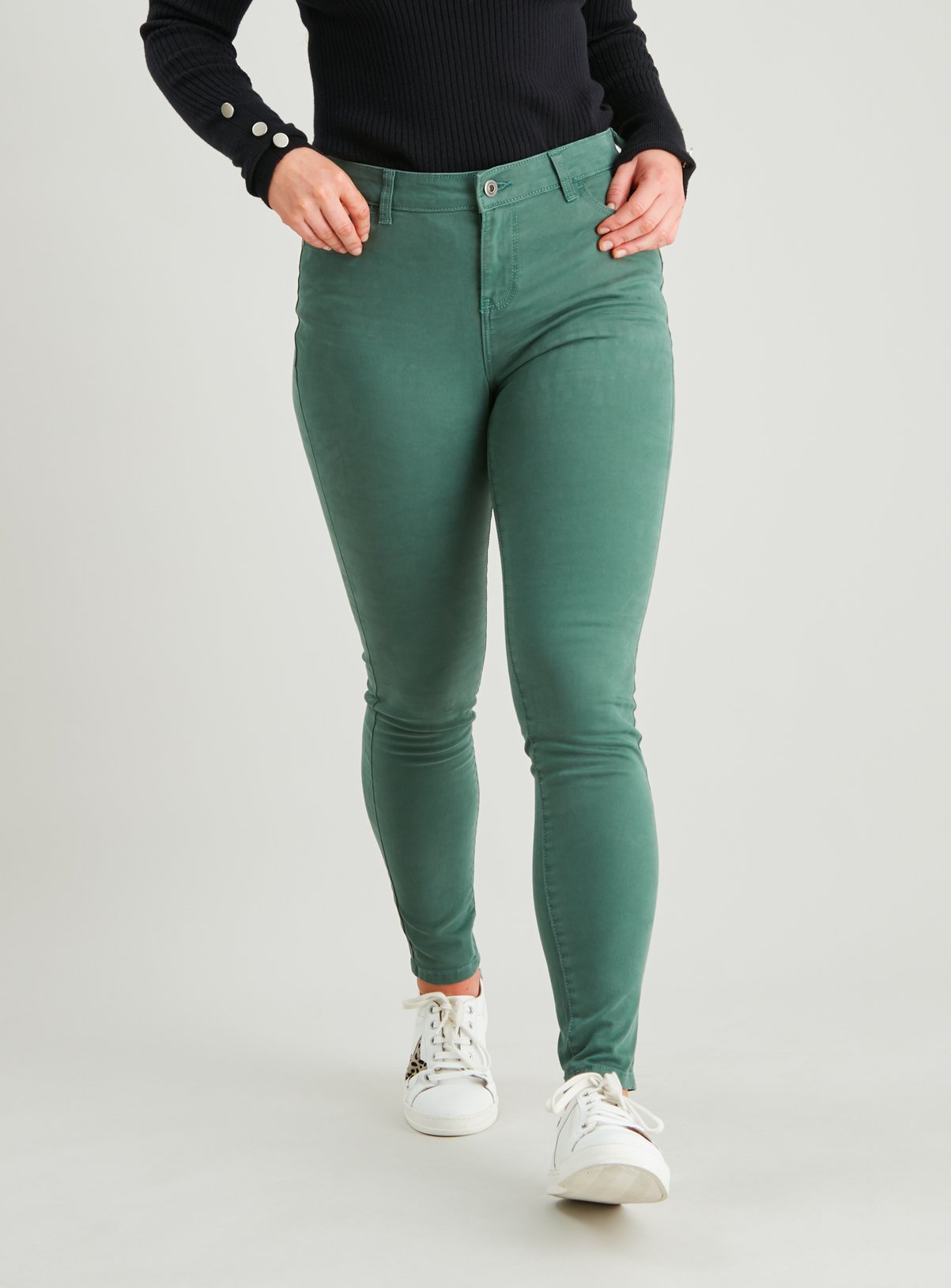 green denim trousers