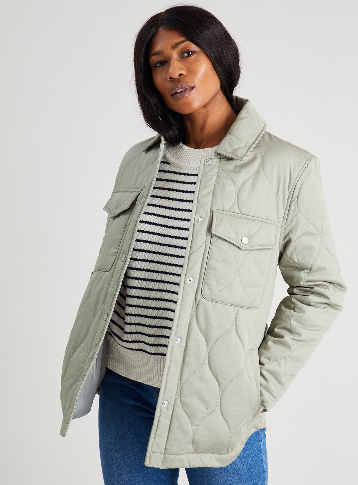 green quilted jacket