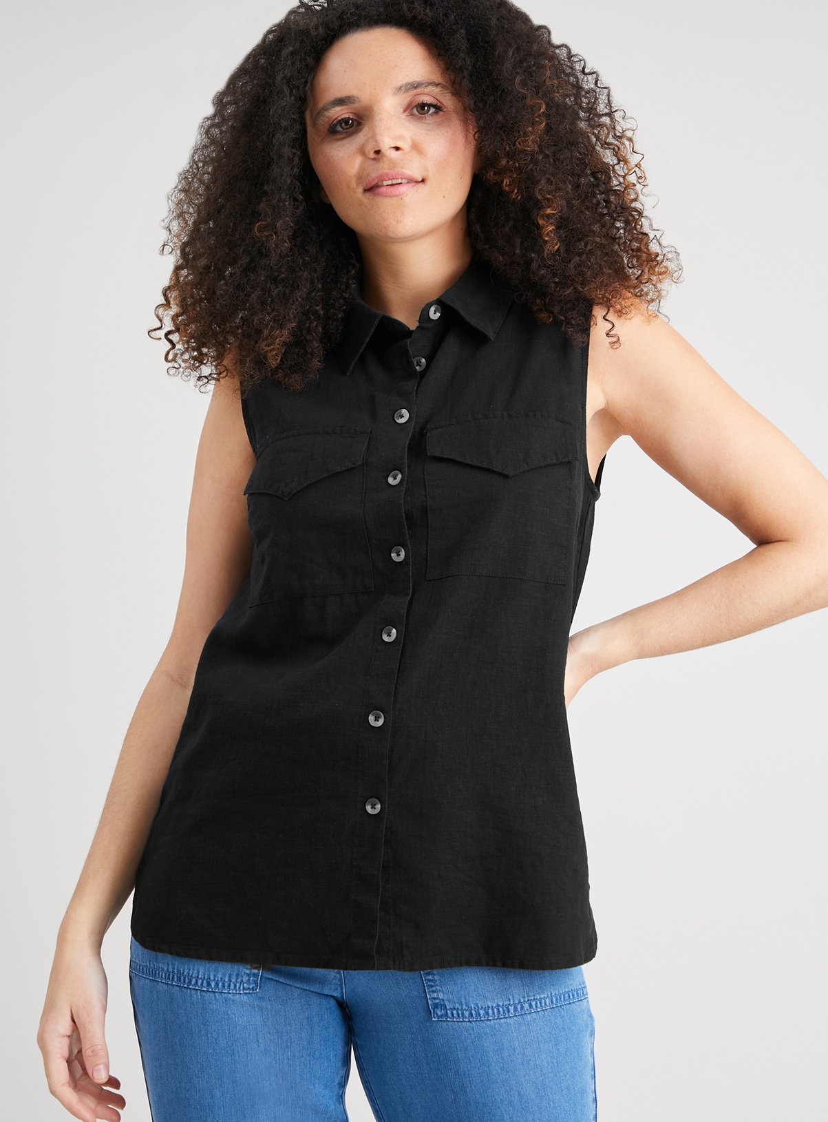 sleeveless black button up