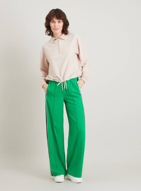 Green trousers with side stripe on sale