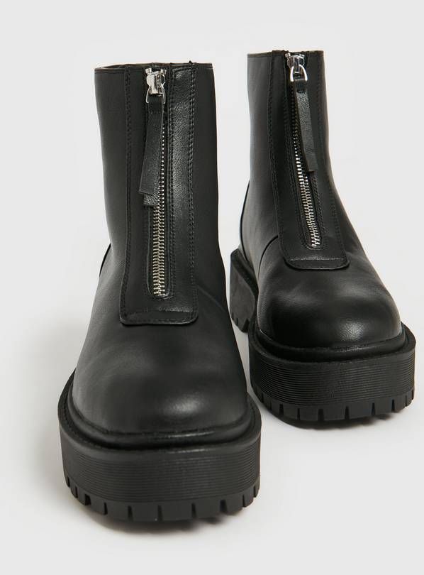 Boots with clearance zip at front