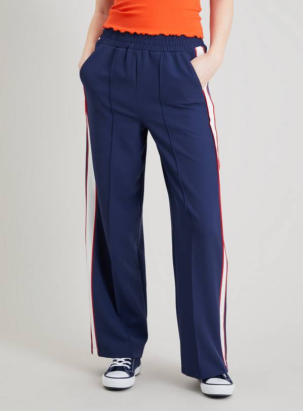 Trousers with store stripe down side