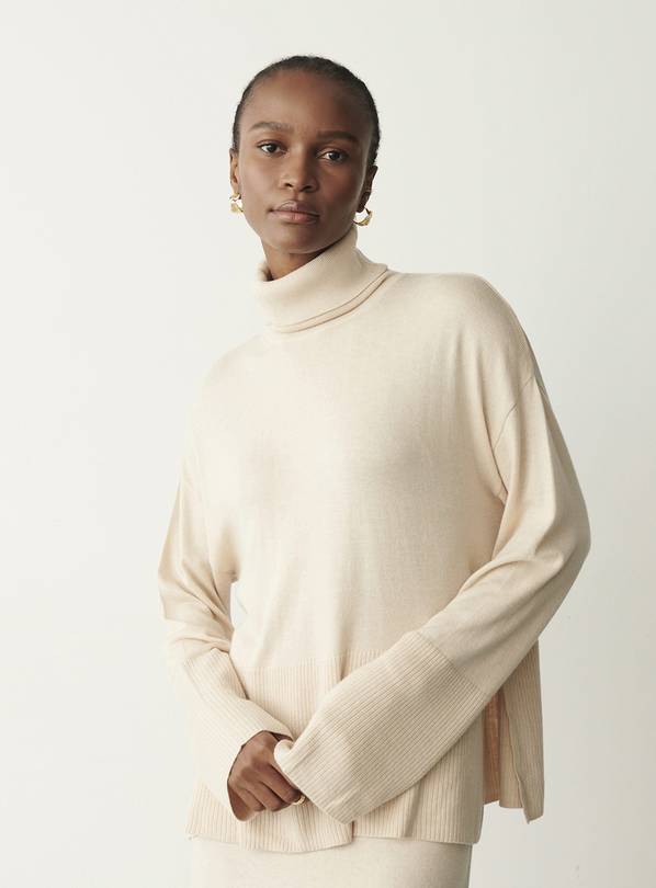 Cream cashmere clearance roll neck jumper