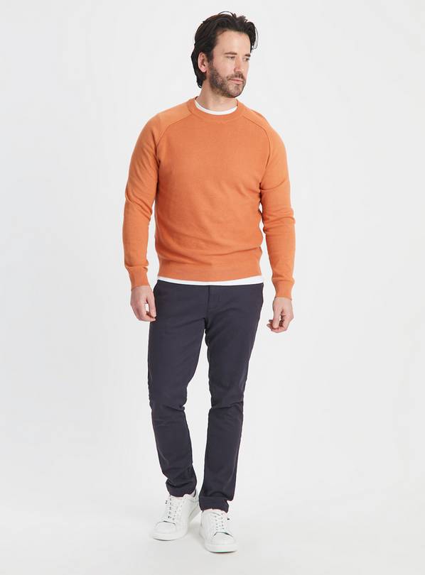 H and 2024 m orange jumper