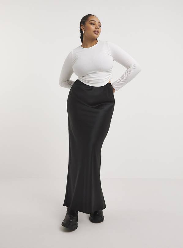 Long black outlet skirt in store