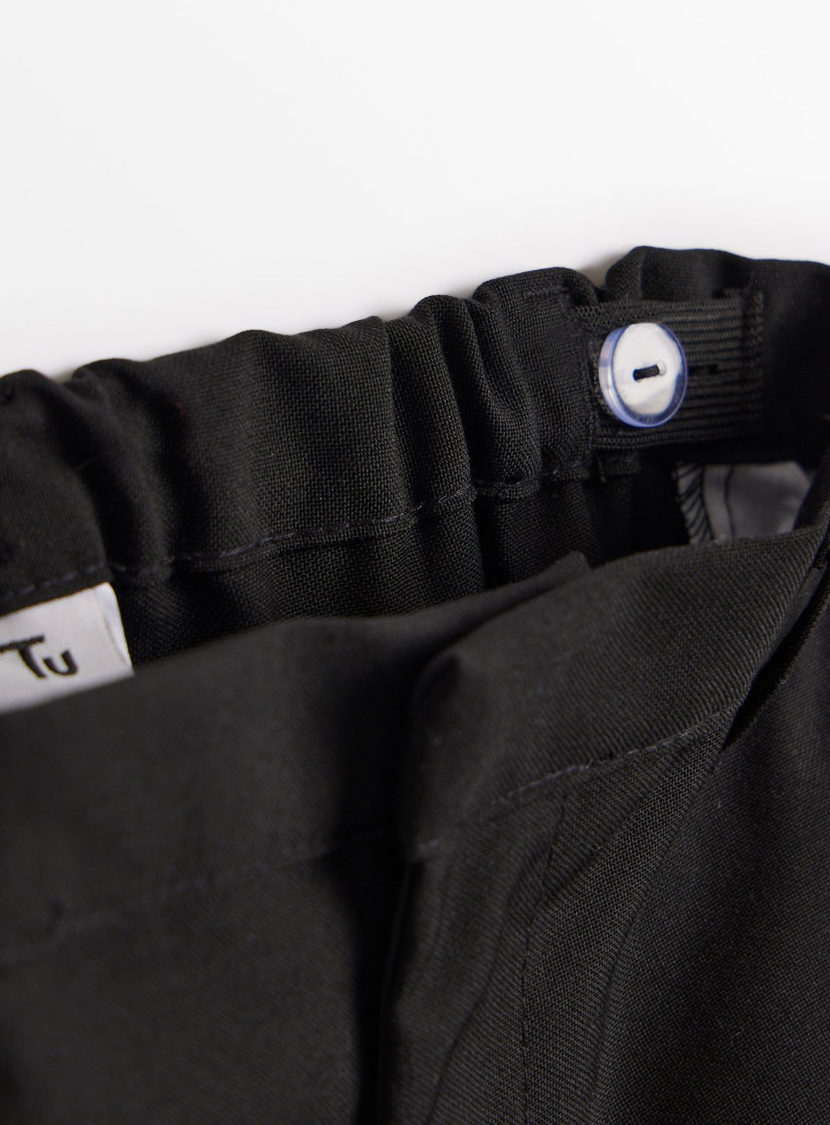 Black Woven Reinforced Knee Extendable Hem Trousers 4 Pack 9 years - Image 2 thumbnail