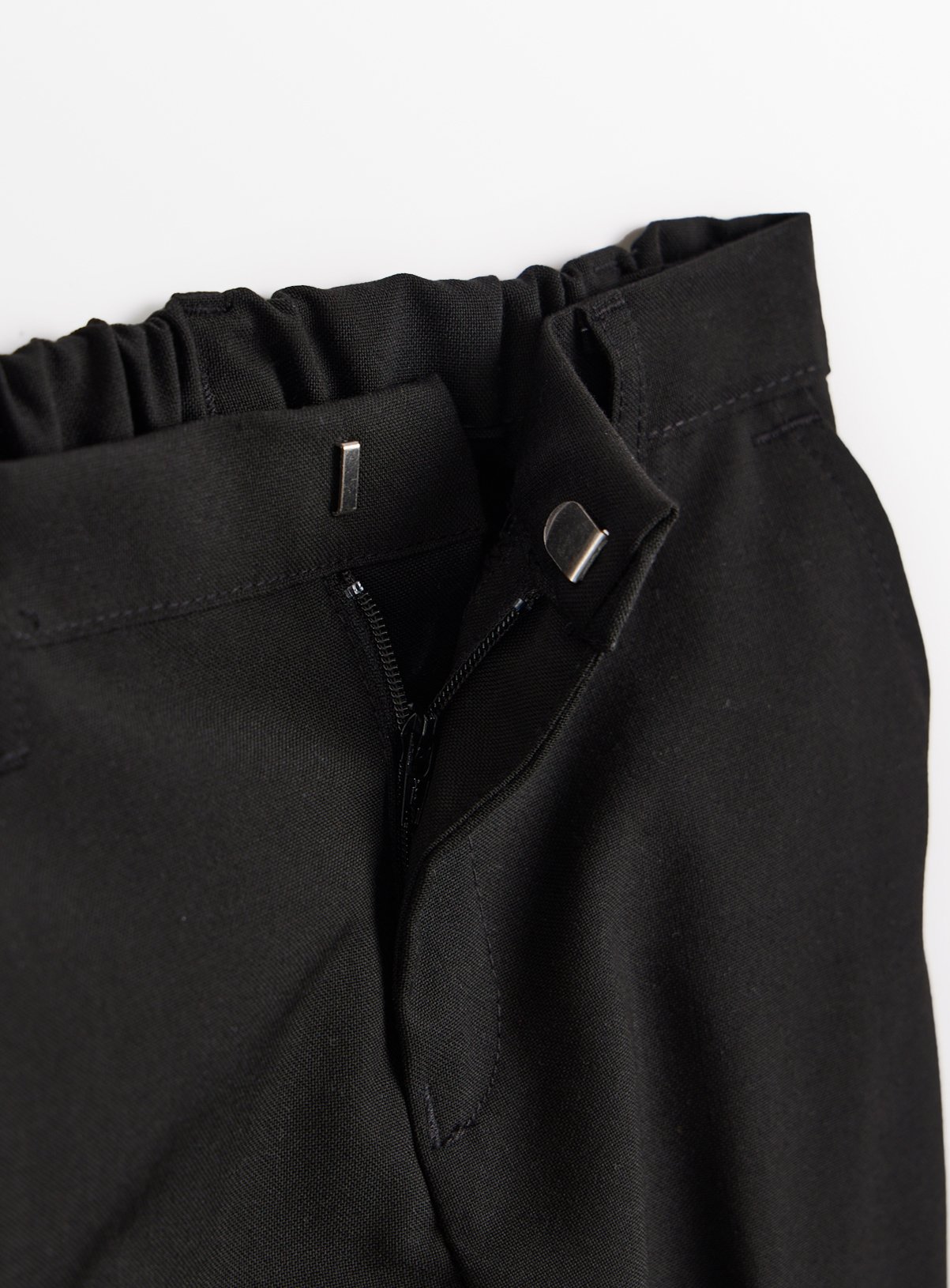 Black Woven Reinforced Knee Extendable Hem Trousers 4 Pack 9 years - Image 3 thumbnail
