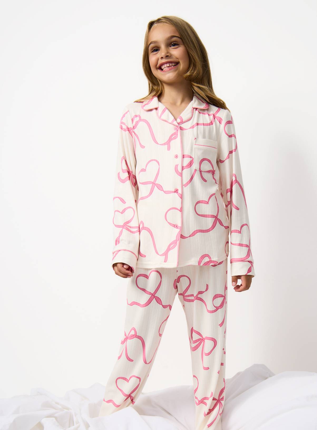 White Bow Print Traditional Pyjamas 11-12 years - Image 1