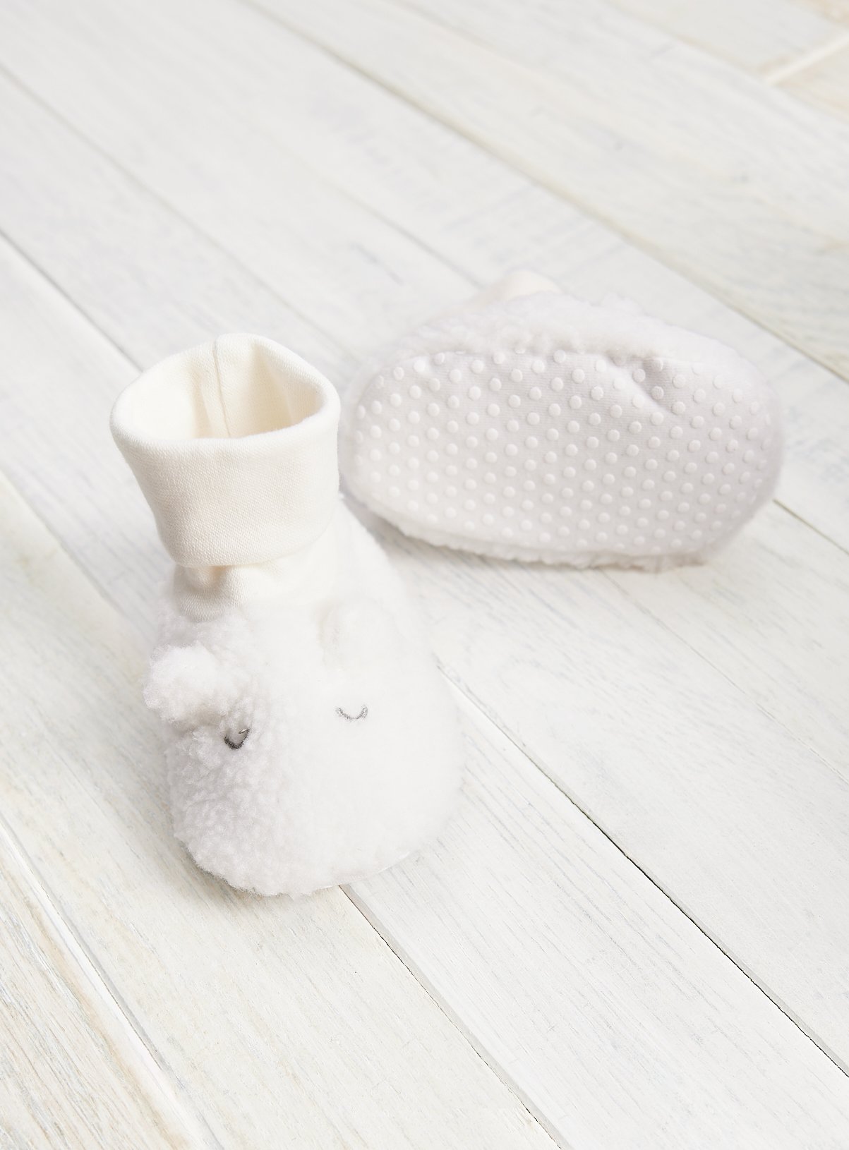 Cream Borg Sock Tops 6-9 months - Image 1 thumbnail