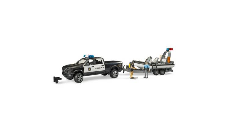 Bruder Light and Sound RAM 2500 Police Pickup with Trailer Boat Figures - Age 3+