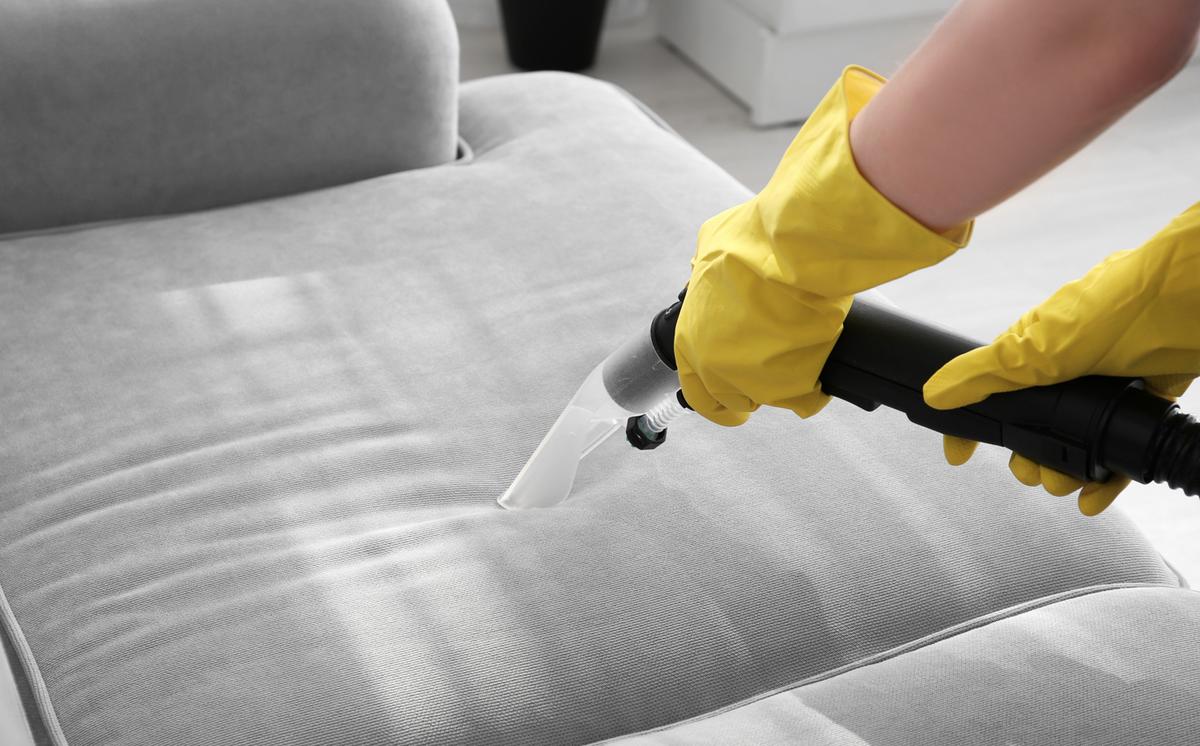 Steam cleaning upholstery.