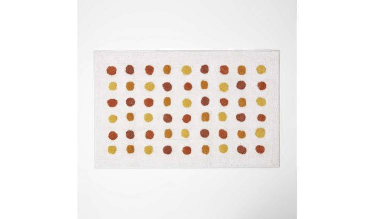 Homescapes Cotton Tufted Polka Dot Bath Mat - Mustard