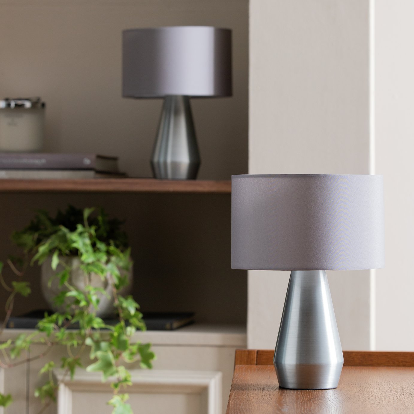 grey and white bedside lamps