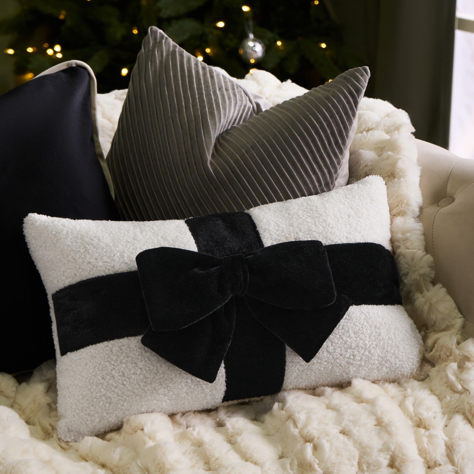 OHS Bow Wrapped Cushion - Black - 30 x 50cm
