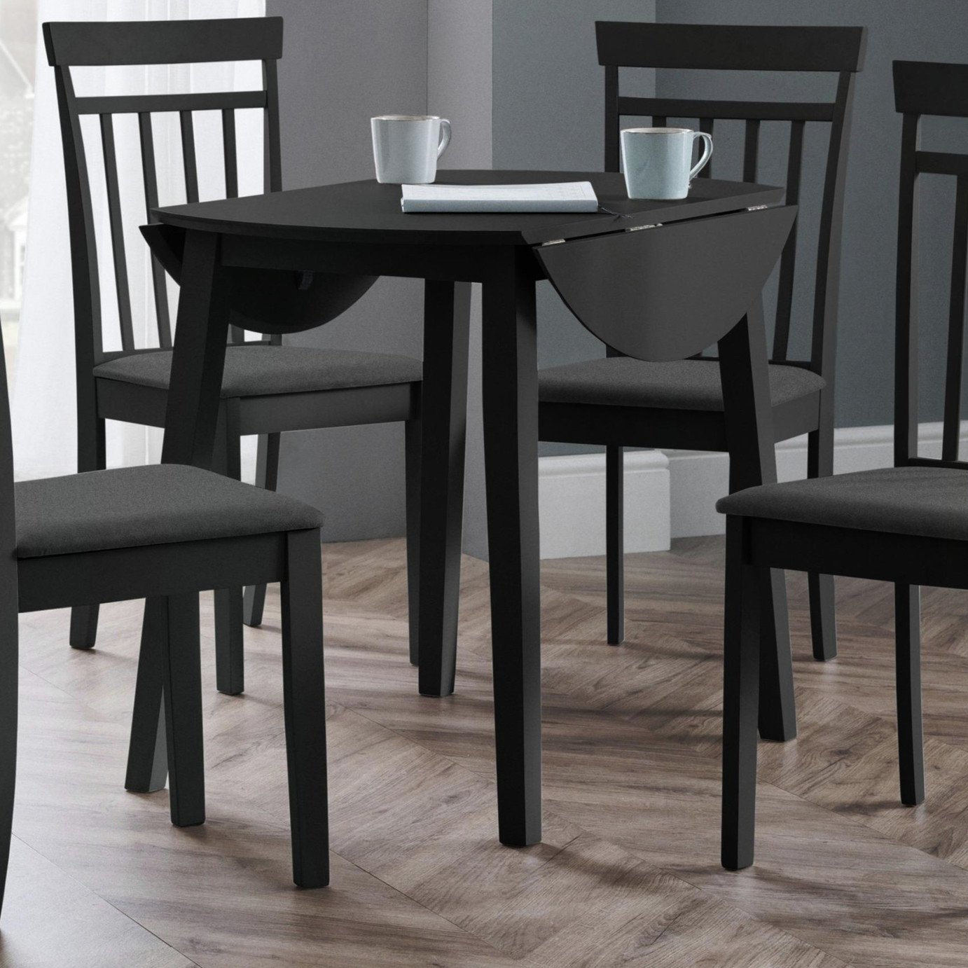 Julian Bowen Coast Ext 4 Seater Round Dining Table - Black