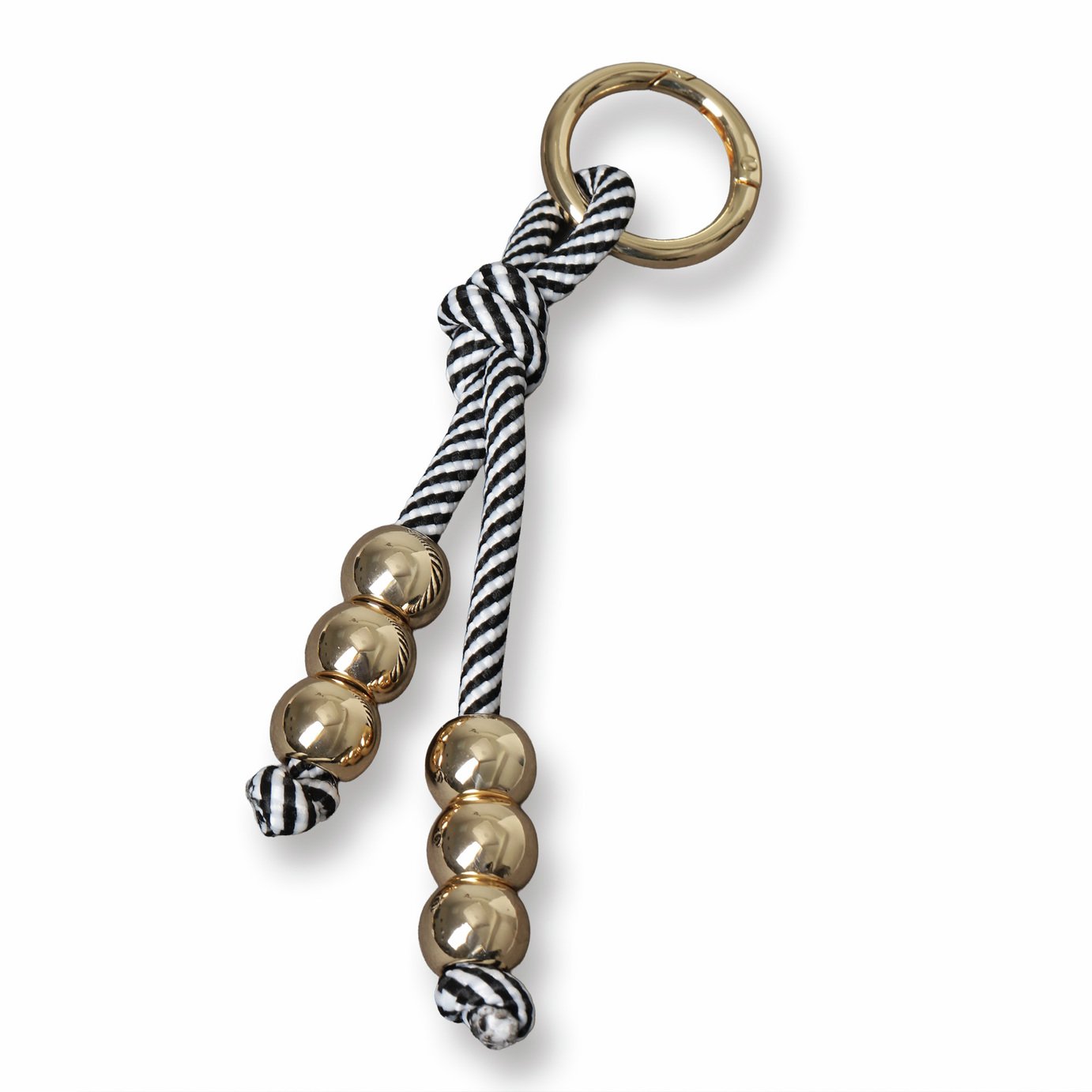 Freedom Gold Tone Beads Black and White Rope Bag Charm