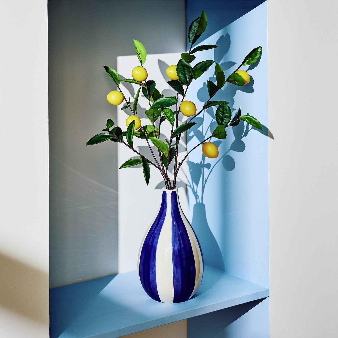 Bayswood Artificial Lemons in Blue Stripe Ceramic Vase - 16cm