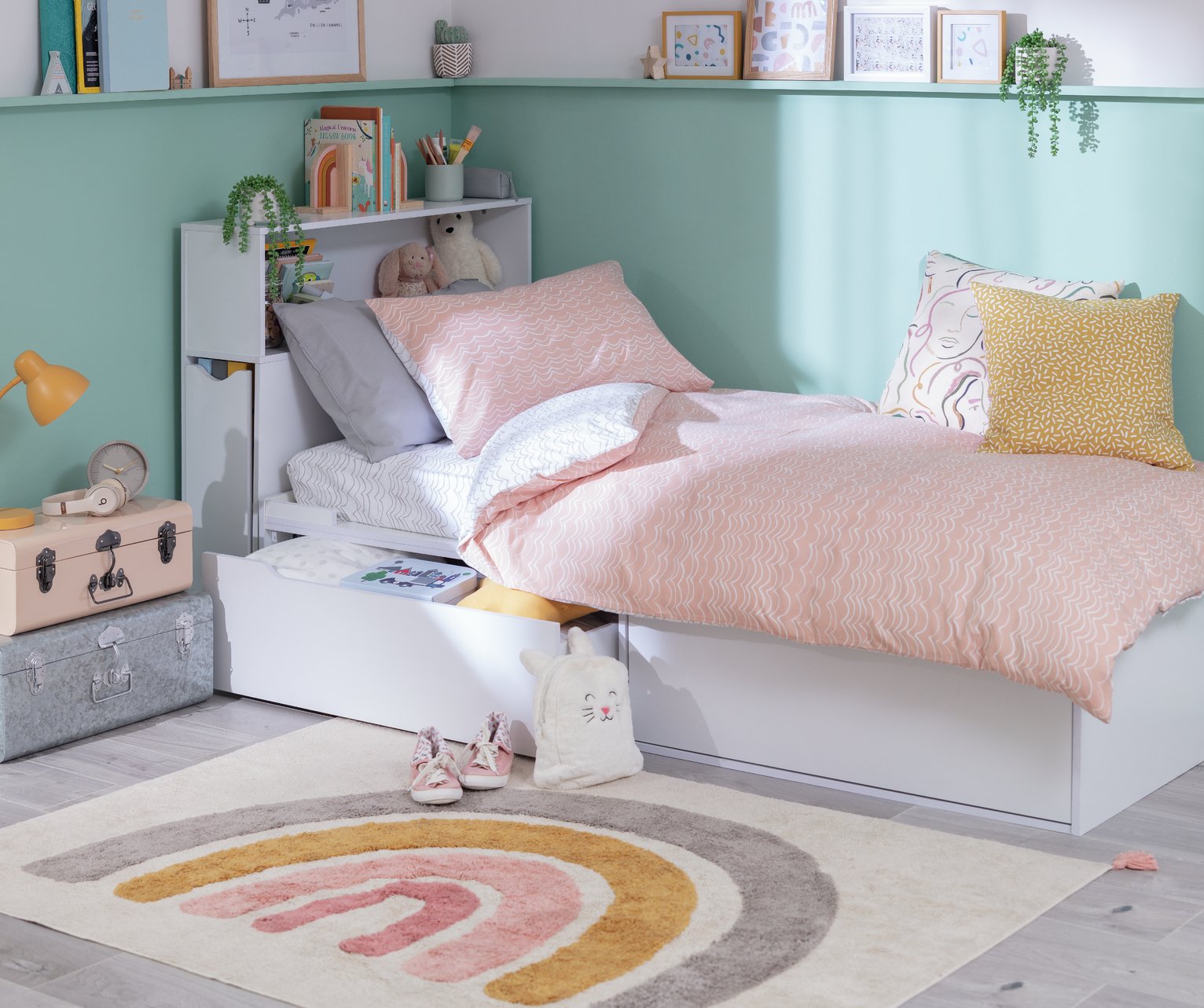 bunk bed with desk under it