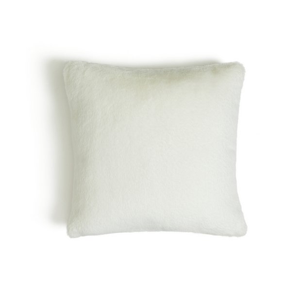 Cream faux shop fur cushions