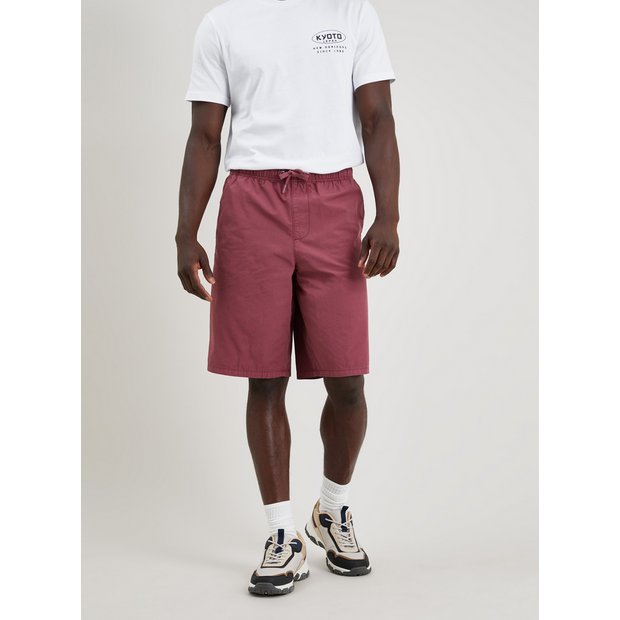 Red Bermuda Shorts with White Polo Shirt